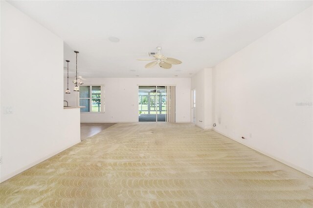 9649 SW 90th St, Ocala, FL 34481 - empty room with a ceiling fan, carpet floors, and baseboards