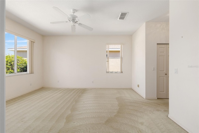 9649 SW 90th St, Ocala, FL 34481 - empty room with carpet floors, a ceiling fan, and baseboards