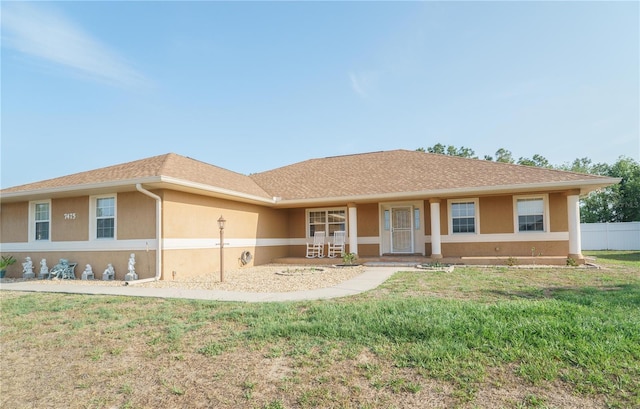 7475 SE 105th Pl, Belleview, FL 34420 - single story home with stucco siding