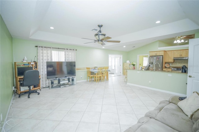 7475 SE 105th Pl, Belleview, FL 34420 - living room featuring a ceiling fan, lofted ceiling, a desk, light tile patterned flooring, and recessed lighting