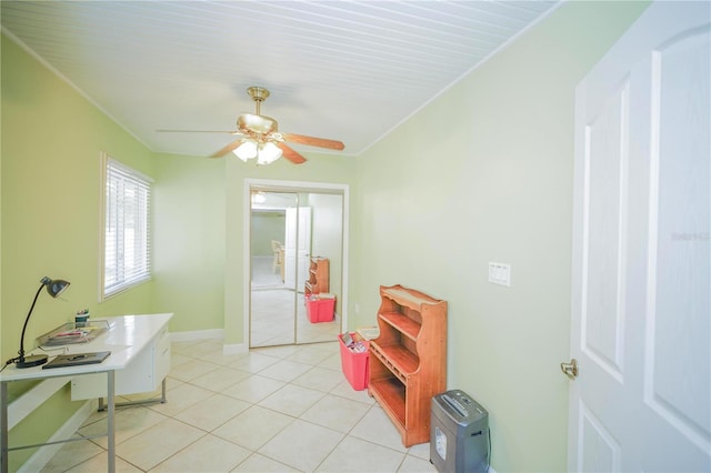 7475 SE 105th Pl, Belleview, FL 34420 - hallway with light tile patterned floors, baseboards, and crown molding