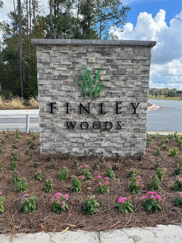 4532 SW 56th Pl, Gainesville, FL 32608 - community sign featuring a water view