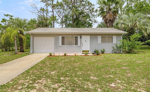 8449 SW 105th Pl, Ocala, FL 34481 - single story home featuring a front lawn, concrete driveway, and a garage