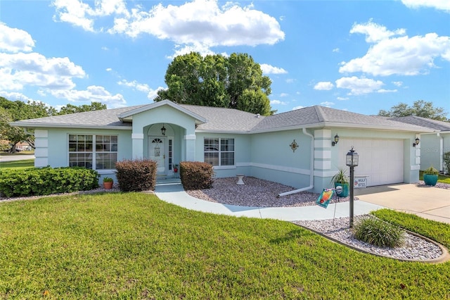 ranch-style house with stucco siding, a front lawn, driveway, an attached garage, and roof with shingles