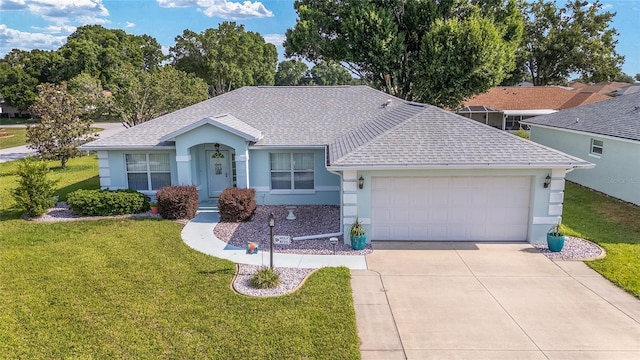 ranch-style home with a garage, stucco siding, a front lawn, and driveway