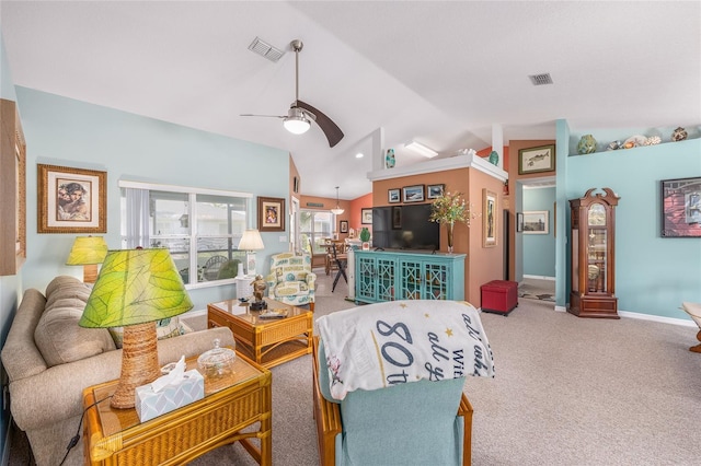 living room with vaulted ceiling, ceiling fan, carpet floors, and baseboards