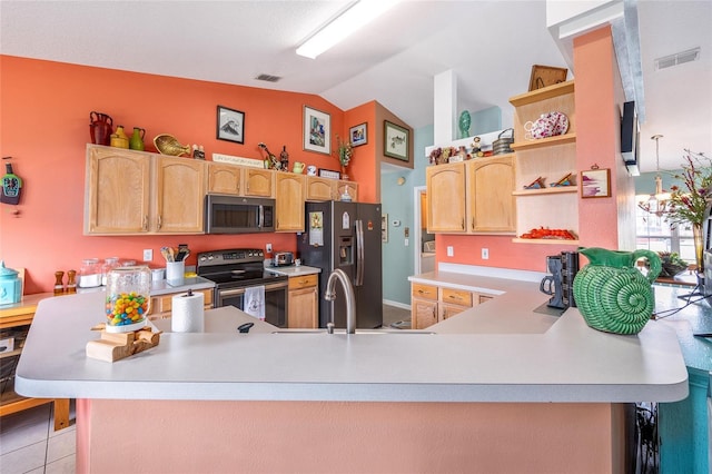 kitchen with appliances with stainless steel finishes, open shelves, vaulted ceiling, light countertops, and light brown cabinetry