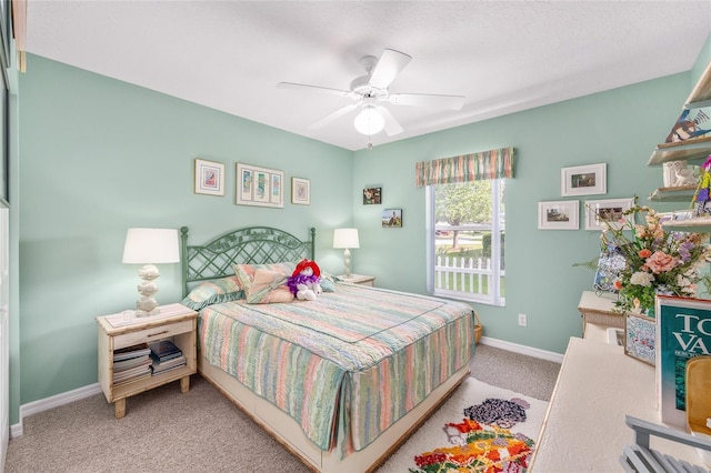 bedroom with carpet, baseboards, and ceiling fan