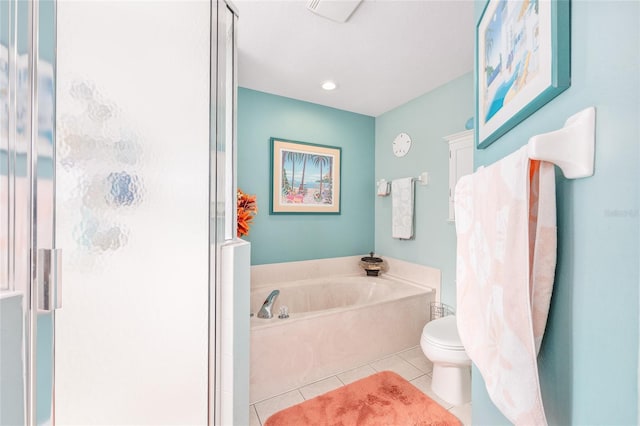 full bathroom featuring a shower stall, tile patterned floors, a bath, and toilet