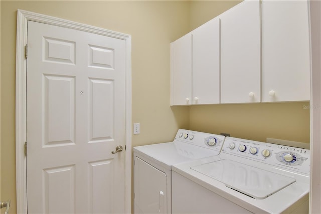2550 NW 55th Avenue Rd, Ocala, FL 34482 - clothes washing area with cabinet space and washing machine and clothes dryer