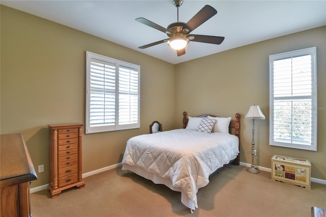 2550 NW 55th Avenue Rd, Ocala, FL 34482 - carpeted bedroom featuring baseboards and a ceiling fan