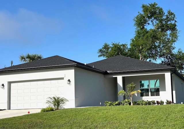 single story home featuring stucco siding, a front lawn, a garage, driveway, and roof with shingles
