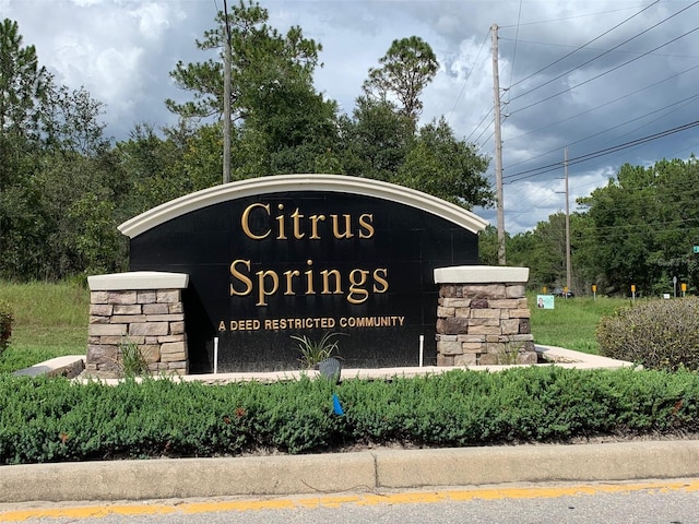 view of community sign