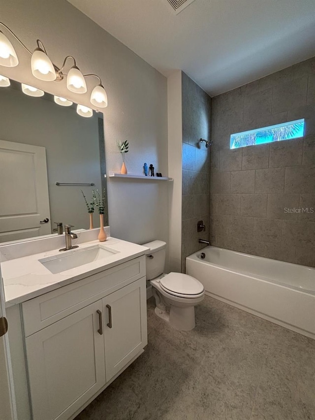 full bath with toilet, vanity, and washtub / shower combination