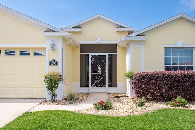 1690 SW 158th Ln, Ocala, FL 34473 - doorway to property with stucco siding and a garage