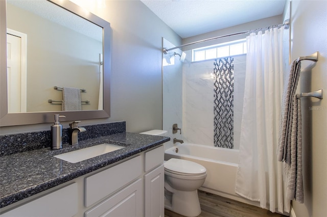 1690 SW 158th Ln, Ocala, FL 34473 - bathroom featuring toilet, shower / bath combo, vanity, and wood finished floors