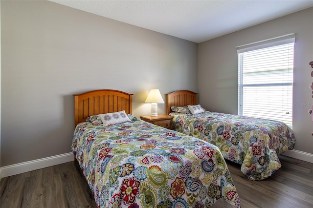 1690 SW 158th Ln, Ocala, FL 34473 - bedroom featuring wood finished floors and baseboards