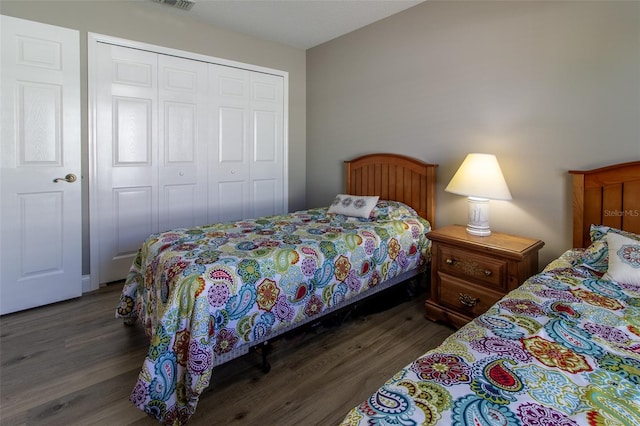 1690 SW 158th Ln, Ocala, FL 34473 - bedroom with wood finished floors and a closet