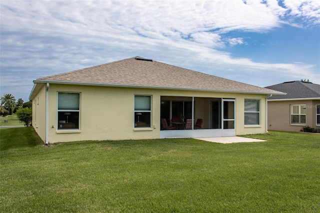 1690 SW 158th Ln, Ocala, FL 34473 - rear view of house featuring a yard, stucco siding, and a sunroom