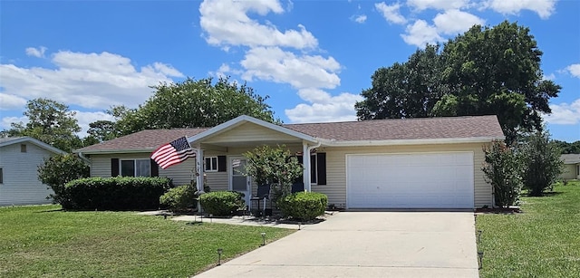 ranch-style home featuring a front lawn, driveway, and an attached garage