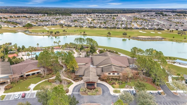 bird's eye view with a water view, golf course view, and a residential view