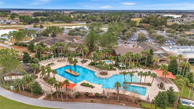 drone / aerial view of a pool