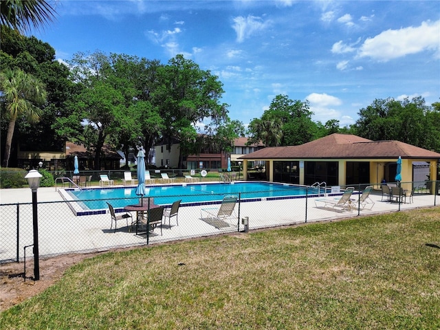 community pool featuring a patio area