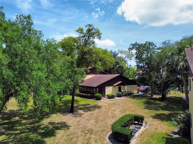 view of front of property with a front lawn