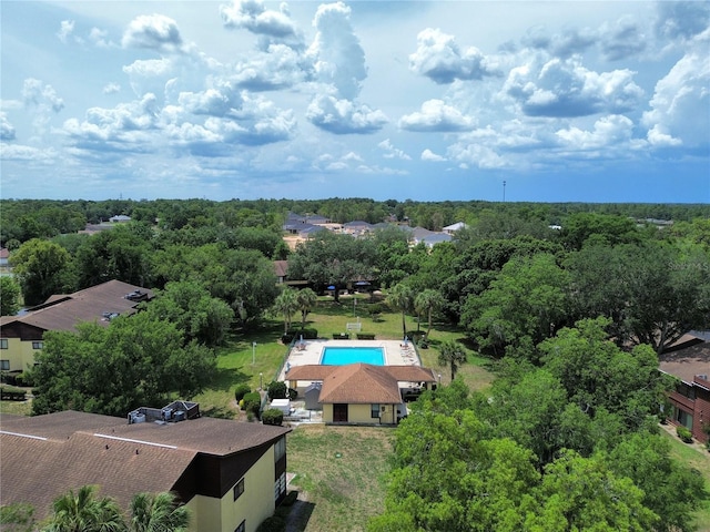 drone / aerial view of a pool area