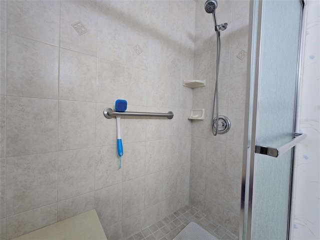 full bath featuring a shower stall