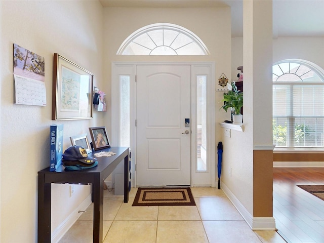 9677 SW 56th Cir, Ocala, FL 34476 - foyer entrance with baseboards and light tile patterned floors