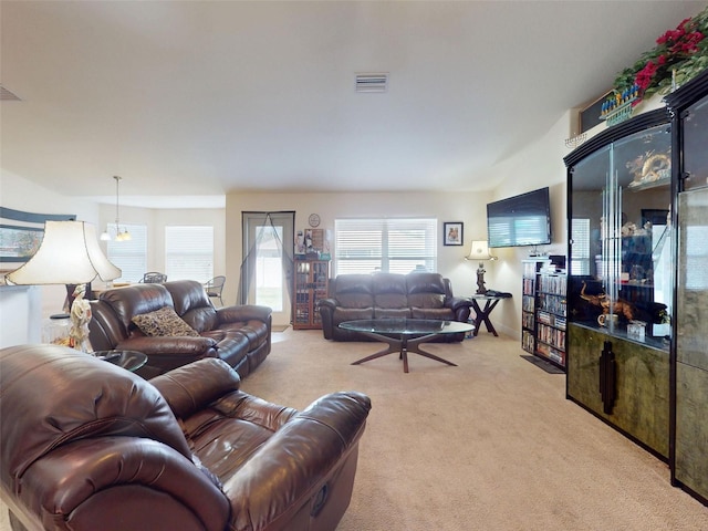 9677 SW 56th Cir, Ocala, FL 34476 - living room featuring light colored carpet