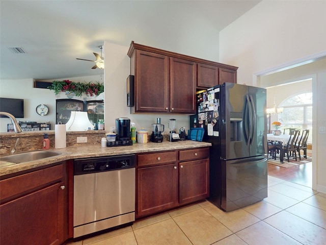 9677 SW 56th Cir, Ocala, FL 34476 - kitchen with dishwasher, black fridge, a ceiling fan, light tile patterned floors, and a sink