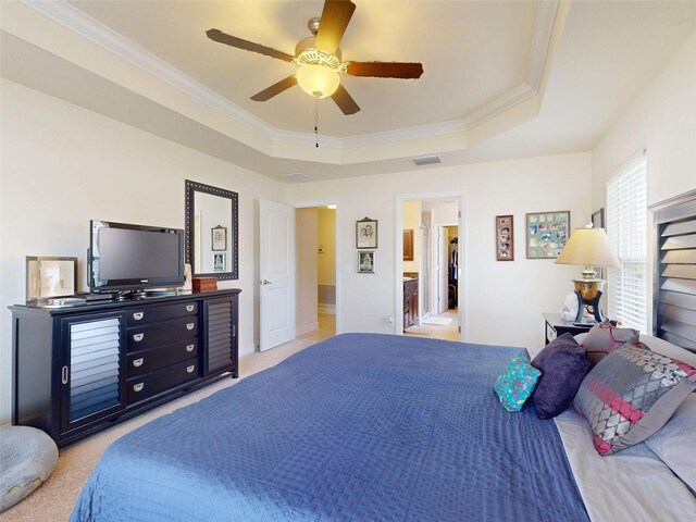 9677 SW 56th Cir, Ocala, FL 34476 - bedroom featuring a raised ceiling, ornamental molding, light carpet, a ceiling fan, and baseboards
