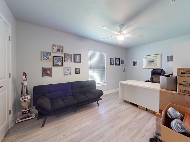 9677 SW 56th Cir, Ocala, FL 34476 - office space with light wood finished floors, ceiling fan, and baseboards