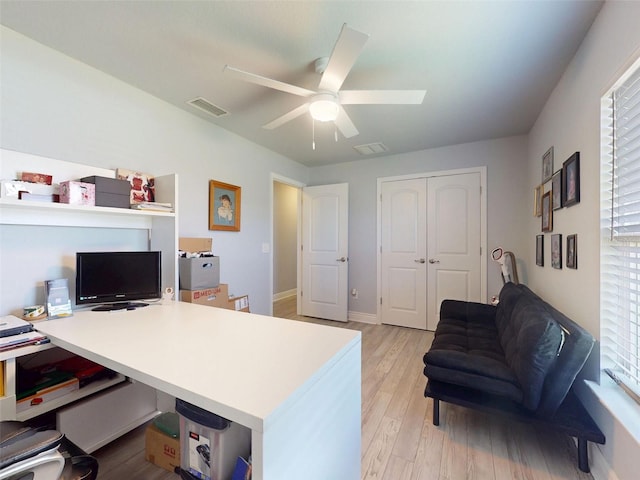 9677 SW 56th Cir, Ocala, FL 34476 - office area with ceiling fan, light wood-style floors, and baseboards