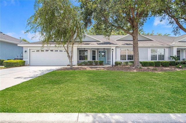 9287 SW 91st Court Rd, Ocala, FL 34481 - ranch-style house with an attached garage, a front yard, concrete driveway, stucco siding, and a shingled roof