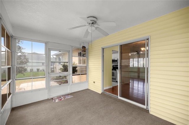 2158 NW 50th Ave, Ocala, FL 34482 - unfurnished sunroom featuring a ceiling fan
