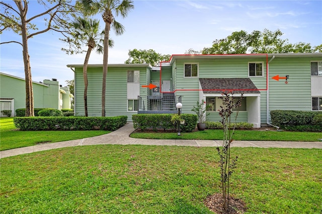 view of front facade with a front lawn