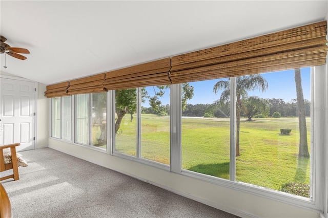 unfurnished sunroom featuring plenty of natural light and lofted ceiling