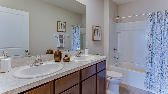8659 SW 44th Ter, Ocala, FL 34476 - bathroom featuring toilet, shower / bath combo with shower curtain, double vanity, and tile patterned floors
