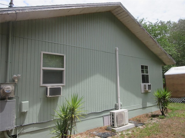 5949 SE 164th Ct, Ocklawaha, FL 32179 - view of side of property with a cooling unit