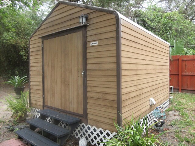 5949 SE 164th Ct, Ocklawaha, FL 32179 - view of shed featuring fence