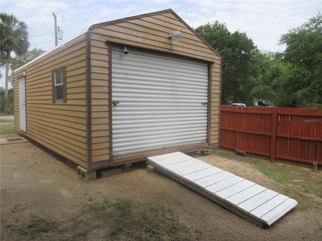 5949 SE 164th Ct, Ocklawaha, FL 32179 - view of outdoor structure with fence and an outbuilding