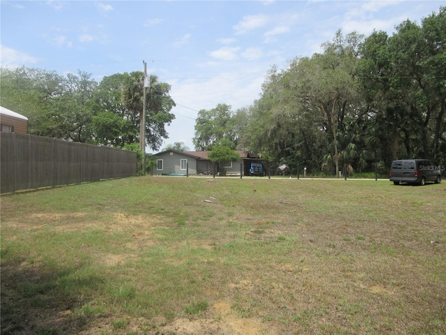 5949 SE 164th Ct, Ocklawaha, FL 32179 - view of yard featuring fence