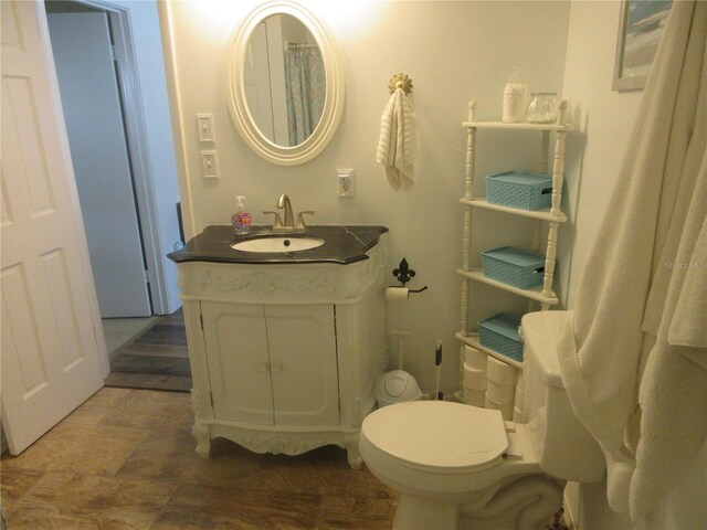 5949 SE 164th Ct, Ocklawaha, FL 32179 - bathroom featuring vanity and toilet