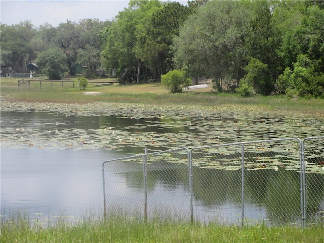 5949 SE 164th Ct, Ocklawaha, FL 32179 - water view featuring fence