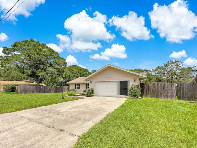 10739 SE 44th Ter, Belleview, FL 34420 - ranch-style house featuring driveway, a garage, and stucco siding