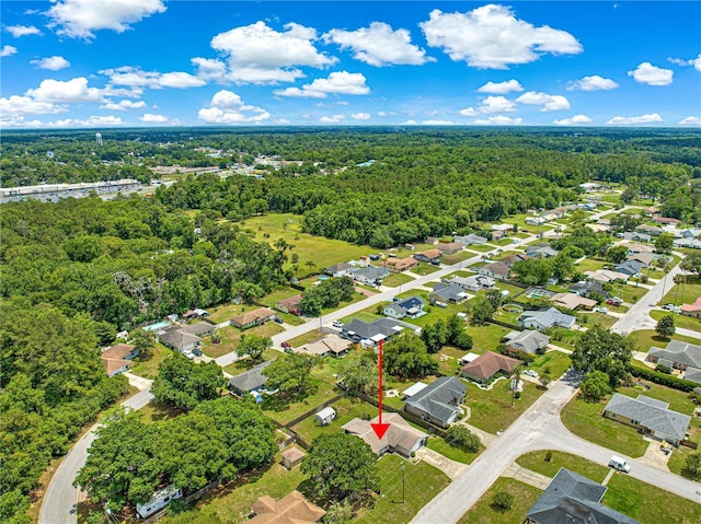 10739 SE 44th Ter, Belleview, FL 34420 - aerial perspective of suburban area featuring a forest