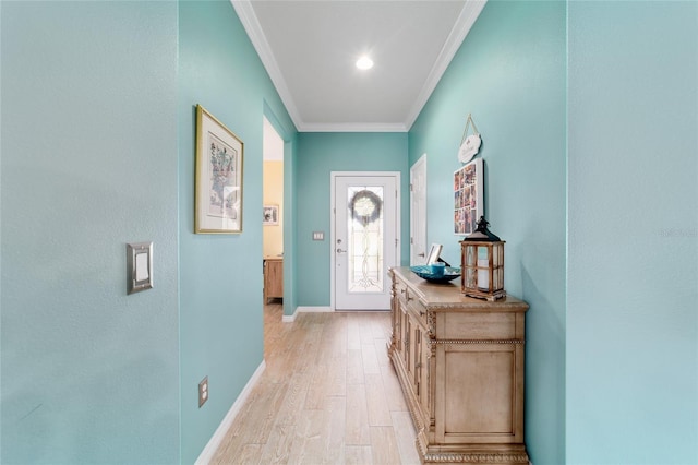 6868 SW 95th Cir, Ocala, FL 34481 - entryway with light wood finished floors, ornamental molding, and baseboards